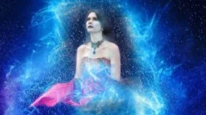 mujer rodeada de energías azules simbolizando el despertar de la consciencia